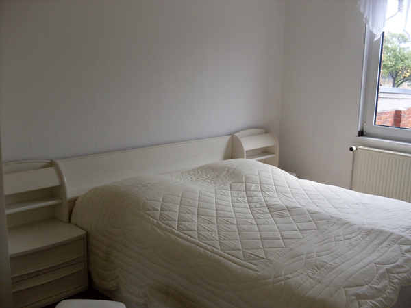 Schlafzimmer mit Doppelbett